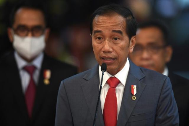 Indonesia’s President says he regrets country’s bloody past as victims demand justice